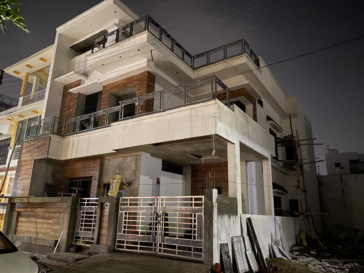 Turnkey construction progress showing modern facade details on site in Dehradun