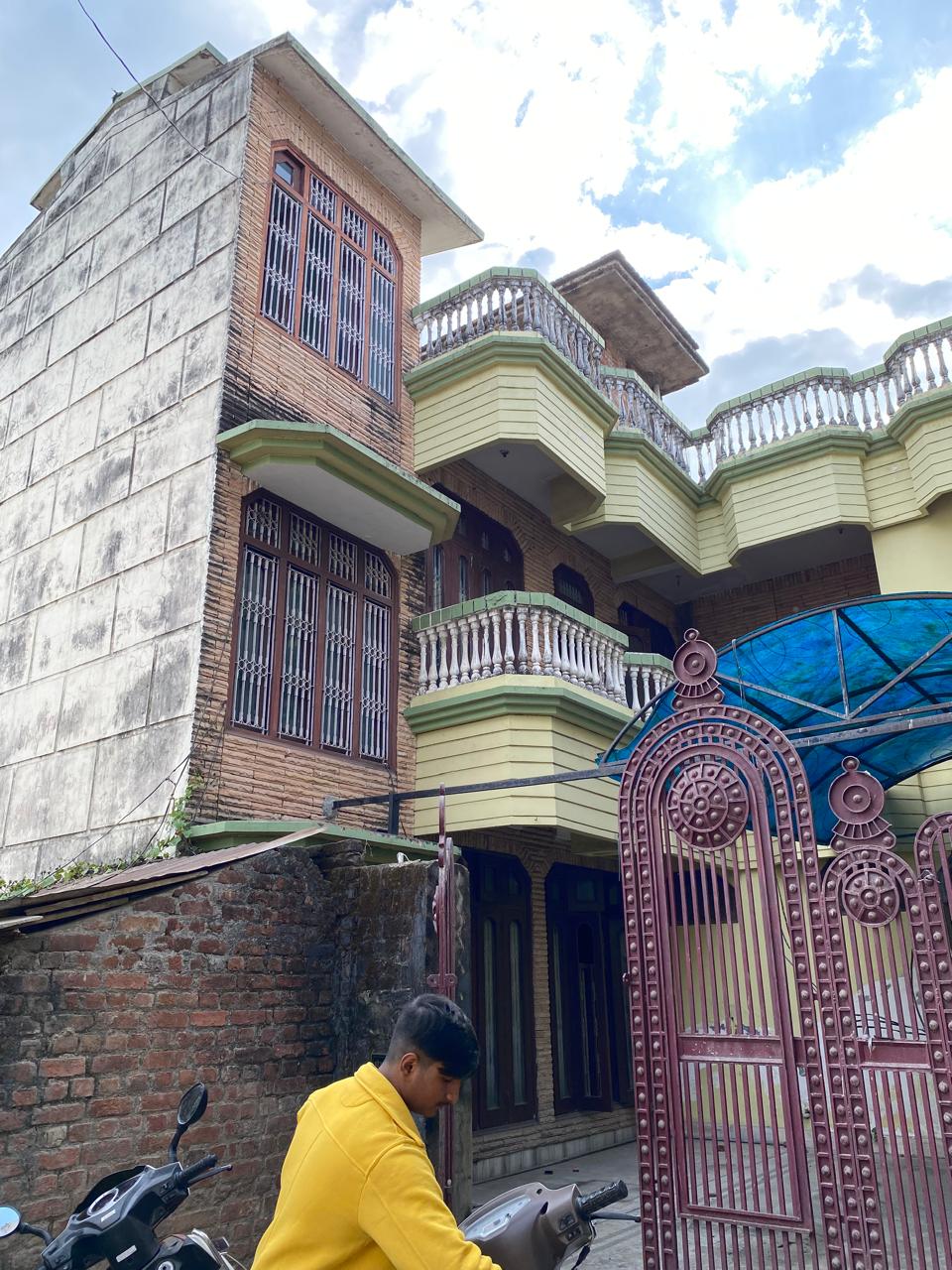 Before renovation - traditional home exterior in Dehradun